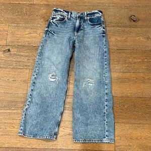 Girls low rise baggy ripped jeans